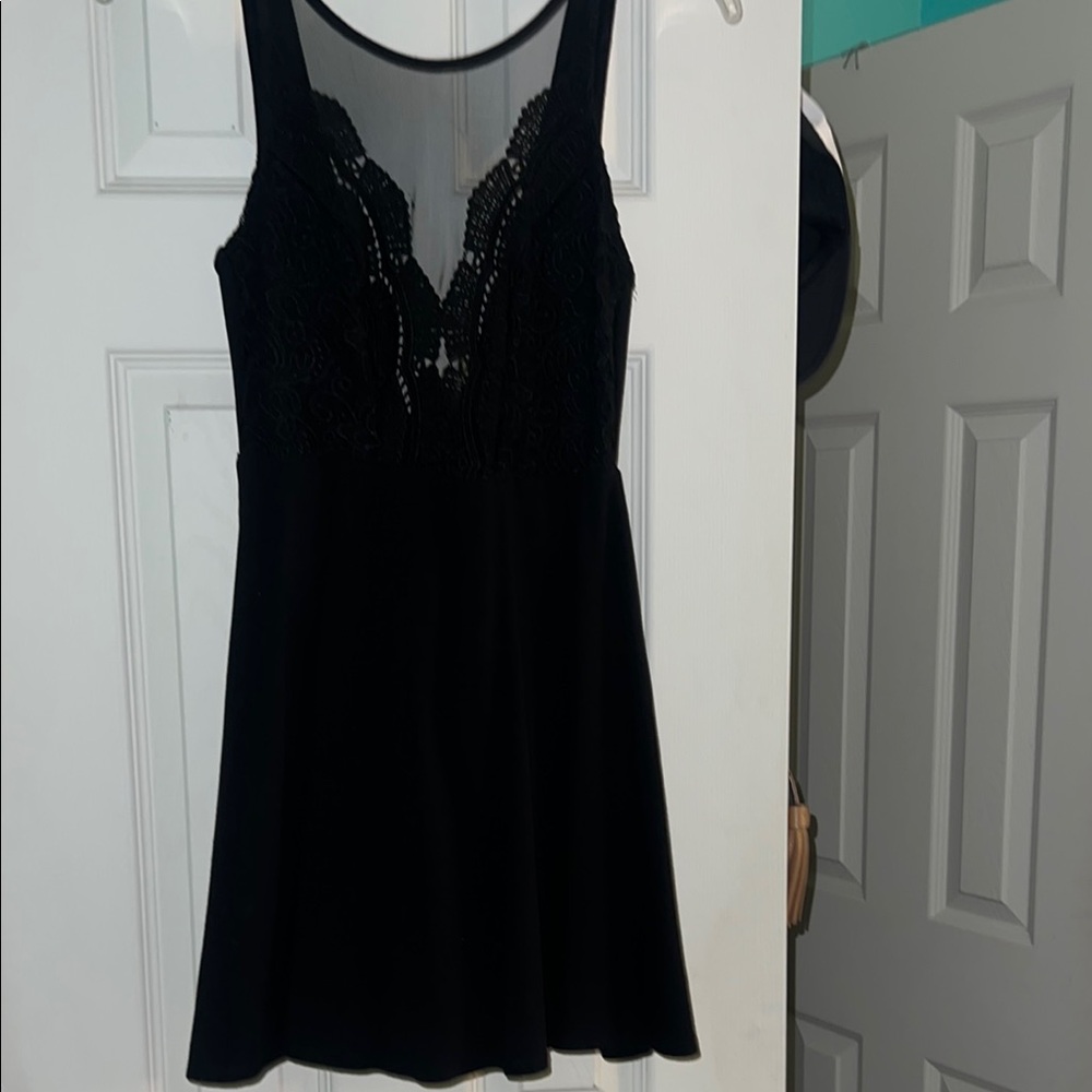 Mini black dress from Lulu’s. Worn once.